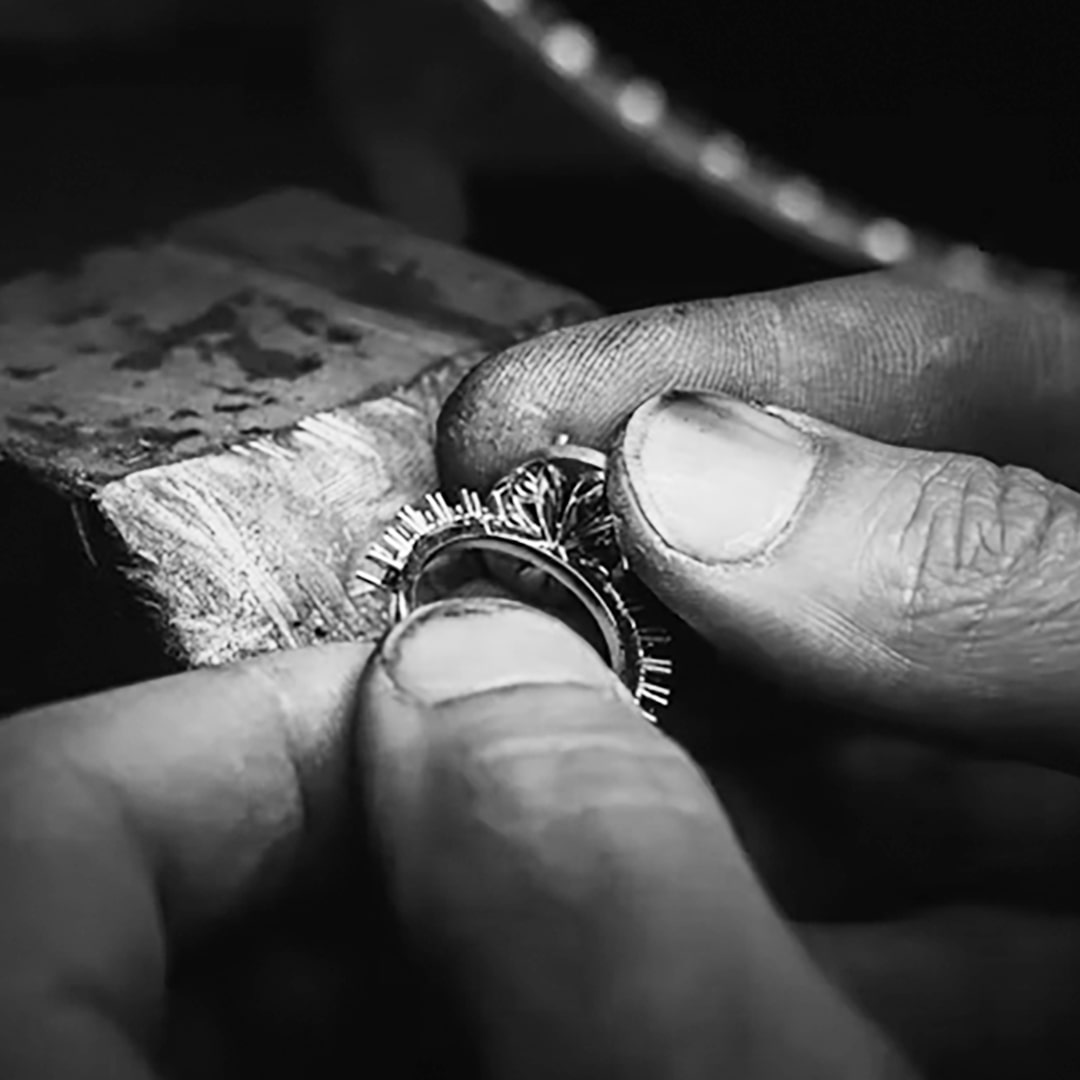 Jeweler Holding Engagement Ring